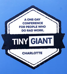 A sign for the Tiny Giant UX conference
