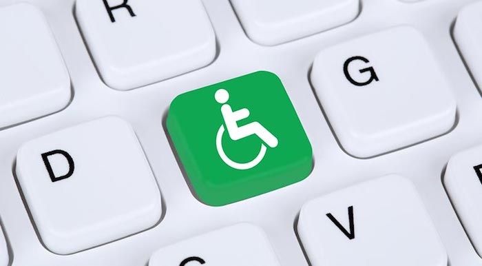 Keyboard shows wheelchair icon amongst the letters