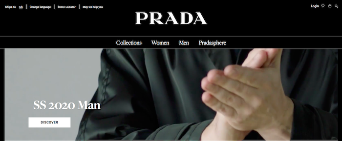 Prada landing page shows close up of man's hands clapping. Also shows clear navigation to product categories. 