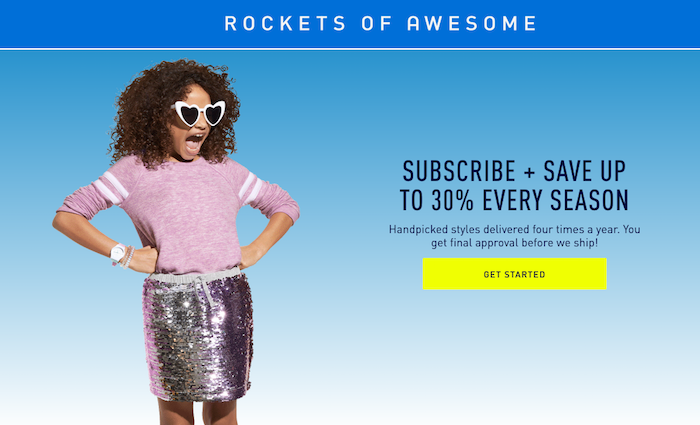 Little girl wears glittery skirt, pink top, and fun sunglasses