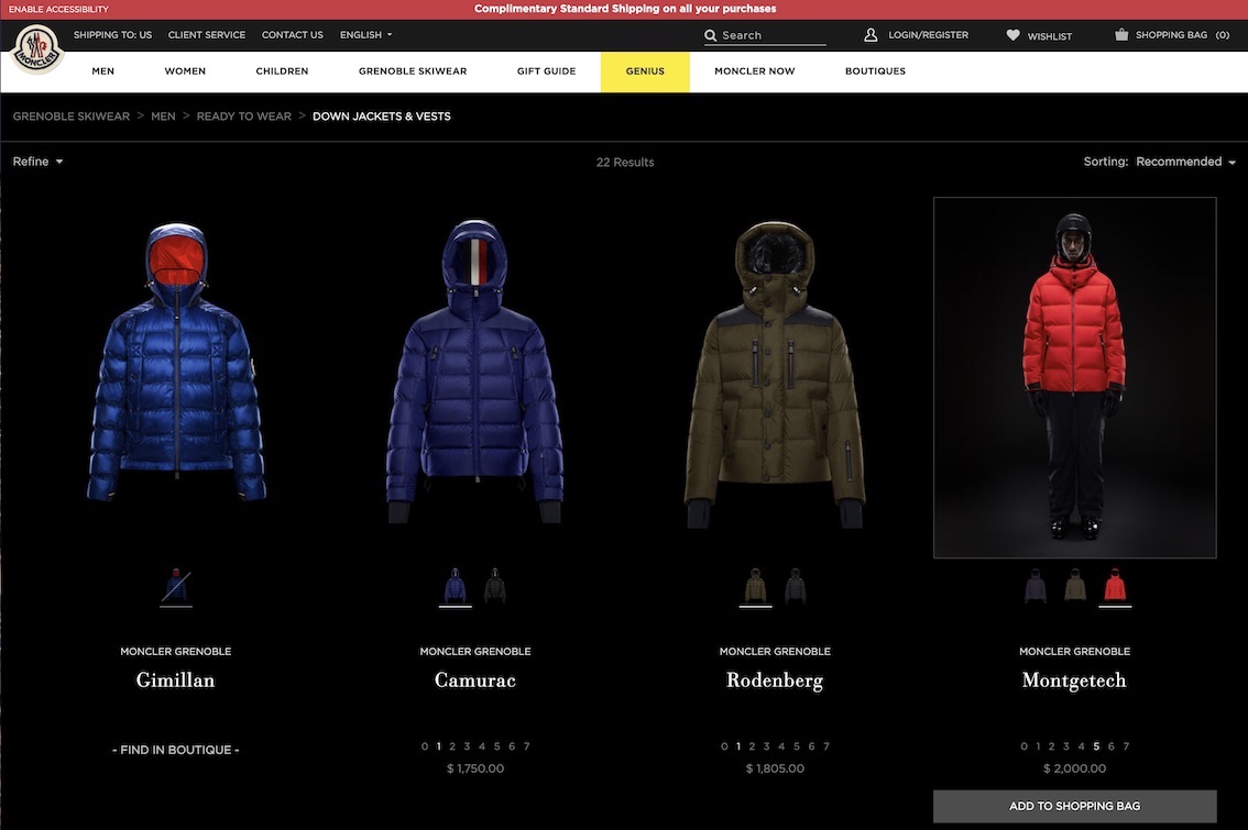Four jackets from Moncler on a black background