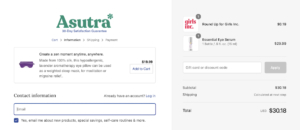 The Asutra site showing an offer for a face mask at checkout